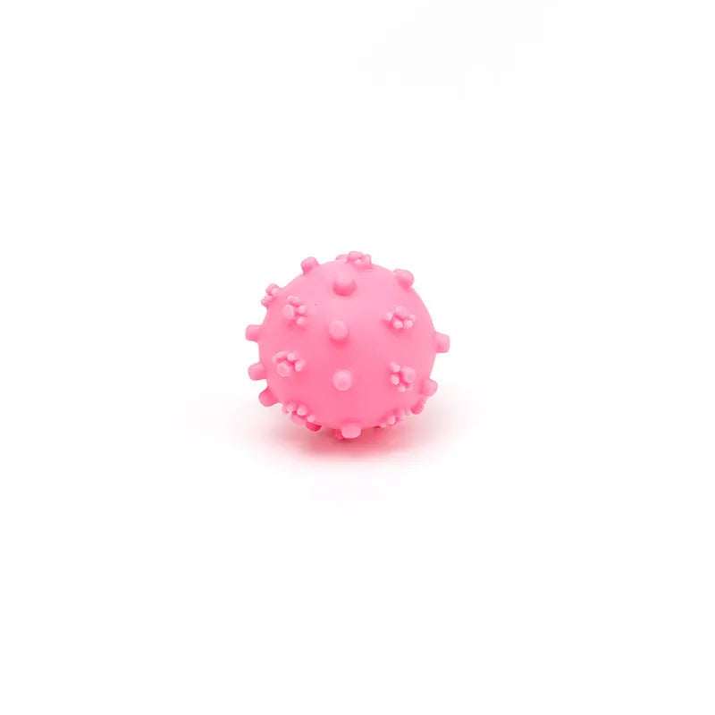 Four colourful spiked dog balls with 2-inch diameter, designed for small breed dental chew and fetch games
