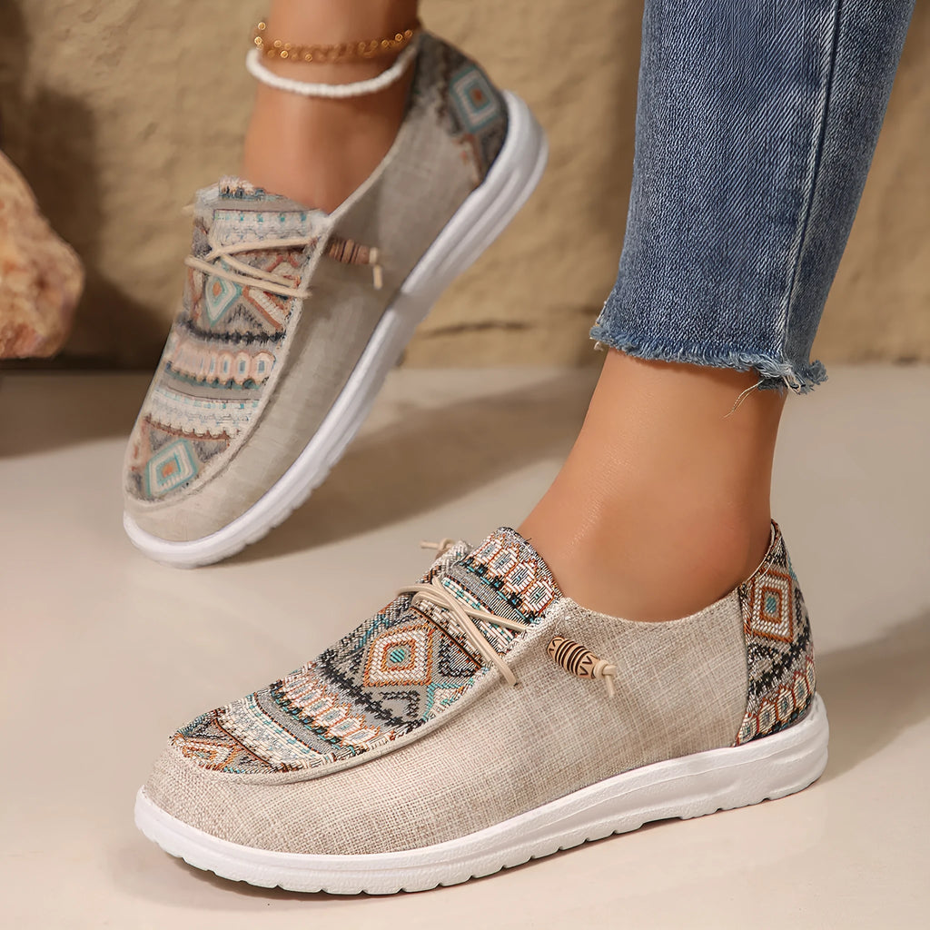 Women's black round toe flat shoes with low-top design and rubber soles