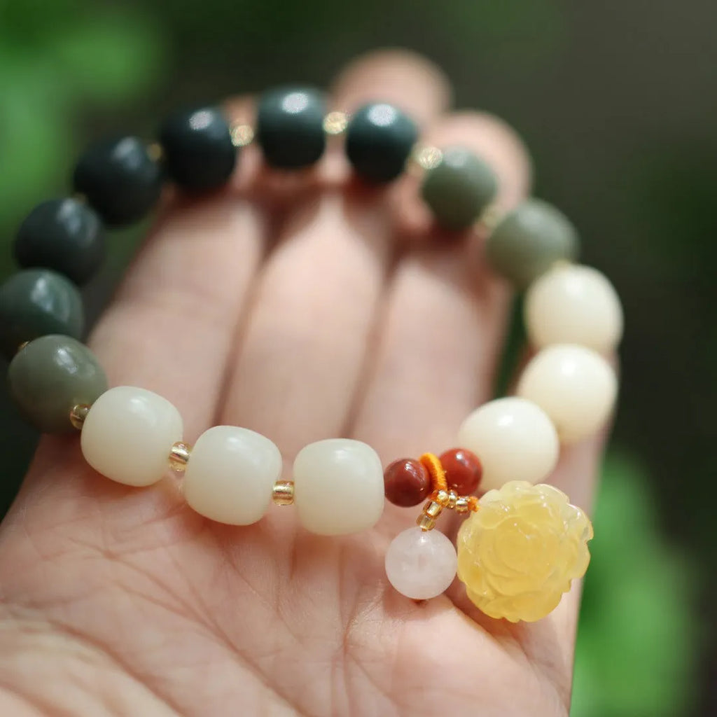 Gradient white jade bodhi bracelet with beeswax lotus pendant, 10mm flower beads
