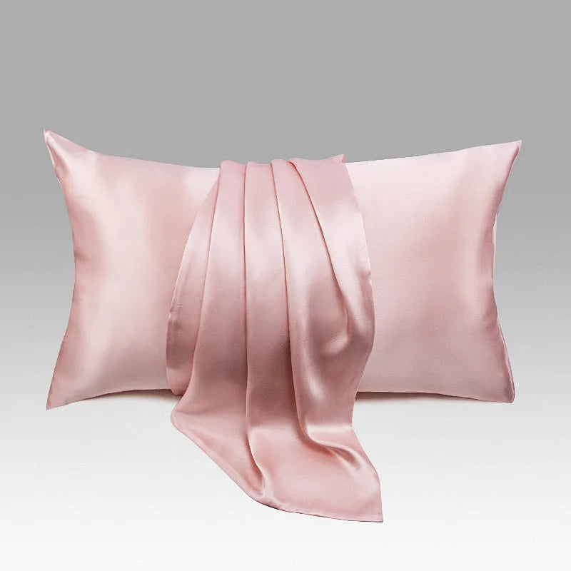 Dark grey mulberry silk pillowcase with envelope closure showing smooth texture and modern simplicity design