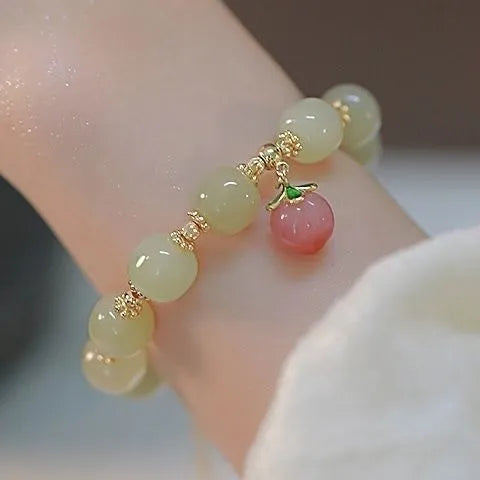 Rabbit motif bracelet with peace buckle clasp made from glass and coloured glaze