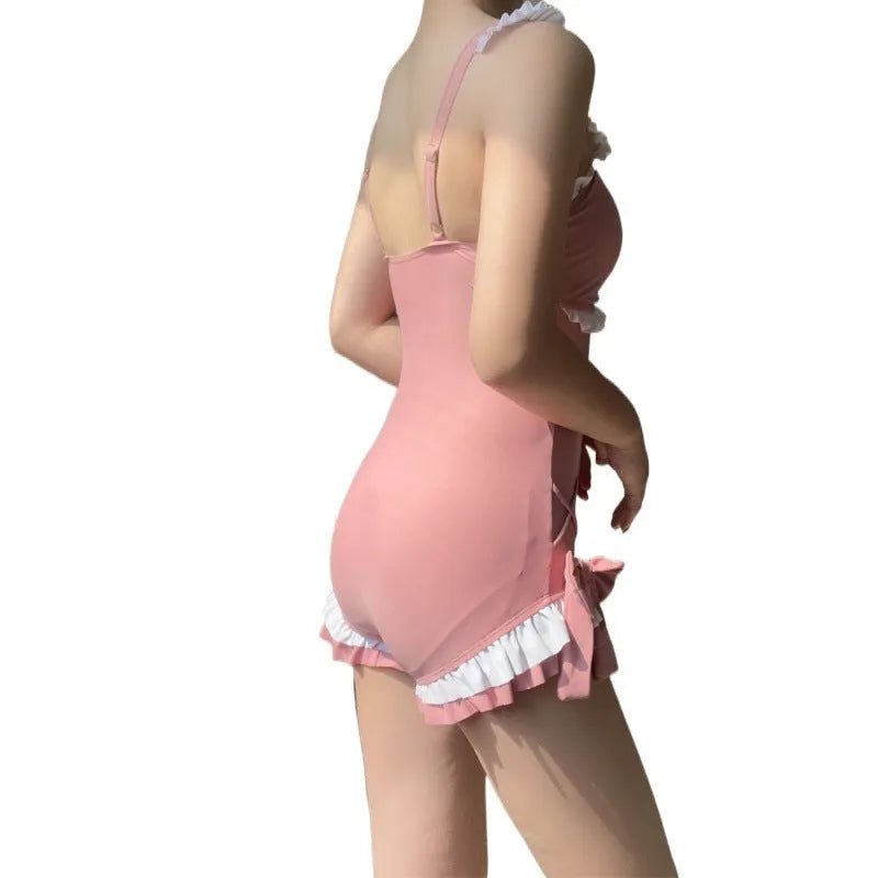 Women's solid pink one-piece sleeveless swimsuit made from milk silk fabric