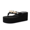Women's high-heeled flip-flops with cotton cloth uppers in black and beige colours