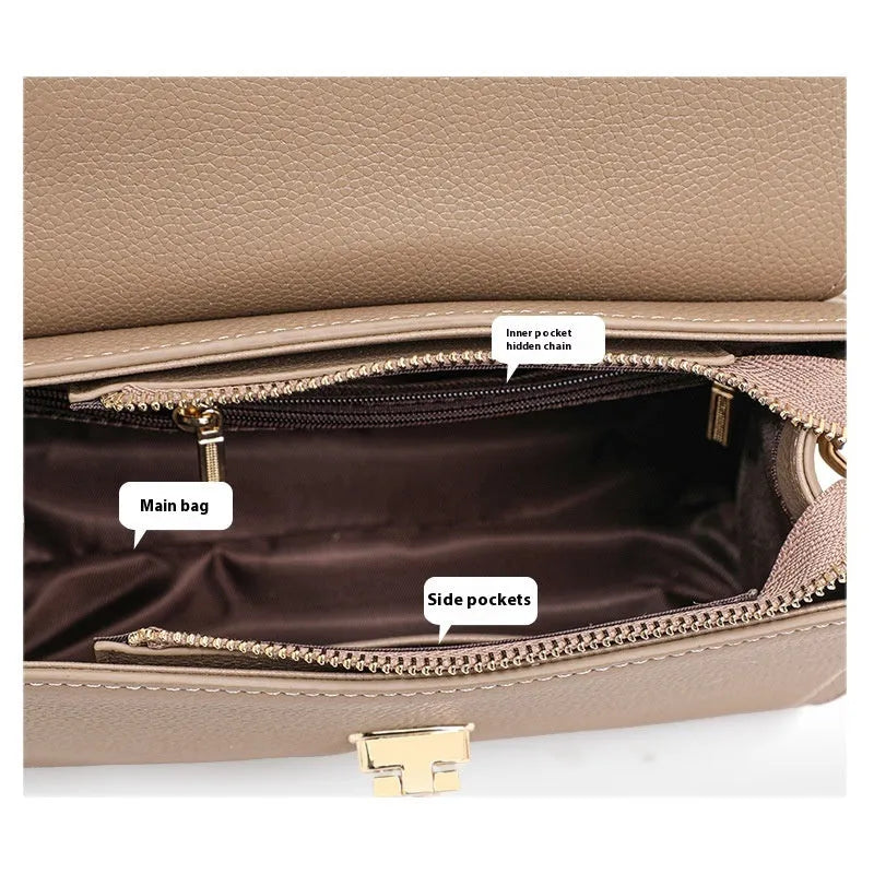Elephant grey genuine leather crossbody handbag with litchi pattern, secure lock, and double shoulder straps