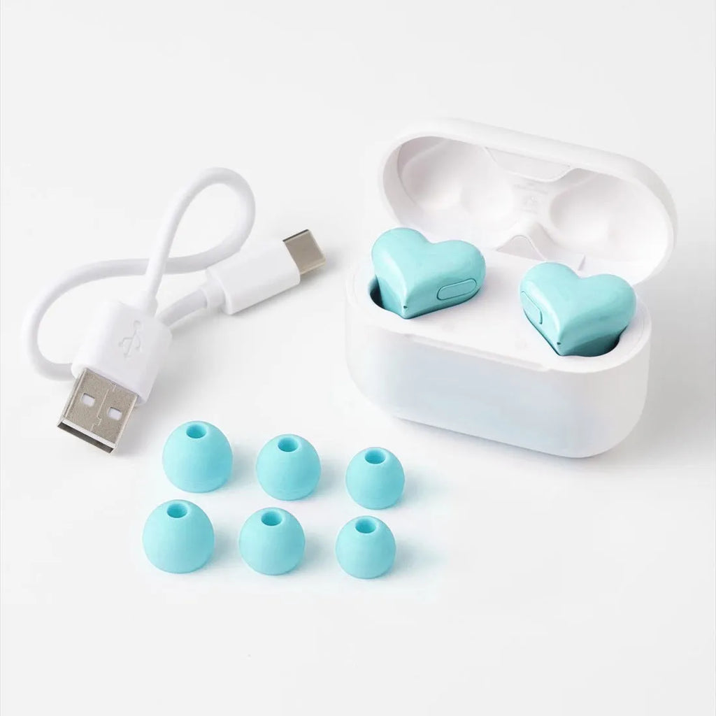 Heart shaped in-ear earphones in light purple, pink, red, and sky blue with plastic charging bay and data cable