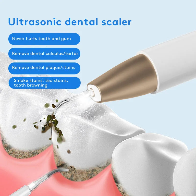 Gold ultrasonic tooth cleaner with three cleaning heads on charging cable next to storage case