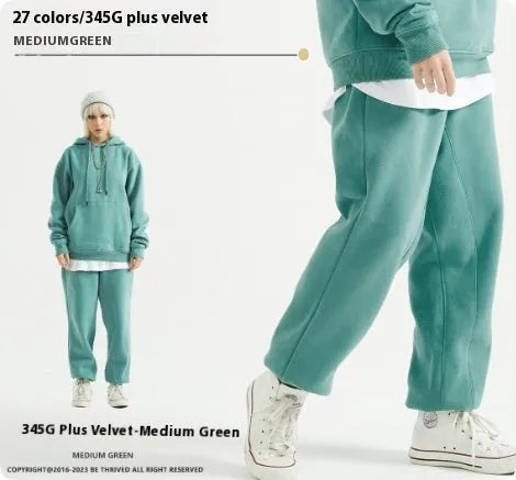 Men's solid colour cotton velvet sweatpants with ankle banding in mid-waist design