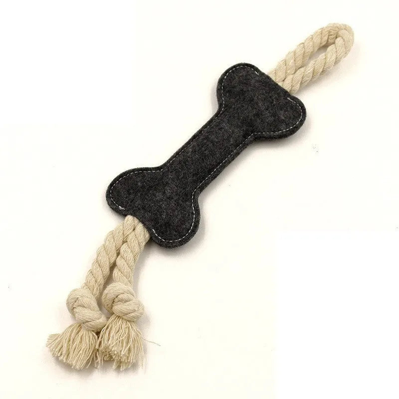 Bone-shaped dog toy with rope knots in felt construction, measuring 16cm by 7cm
