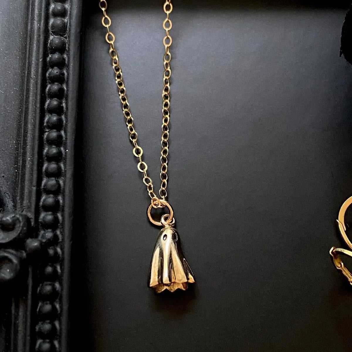 Ghost pendant necklace with titanium steel pendant and stainless steel chain in Cable, Figaro, or Mini Staple style