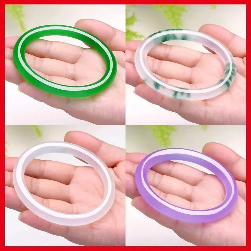 Women's jade bracelet with ice-like emerald appearance and floating flower patterns in multiple colour options