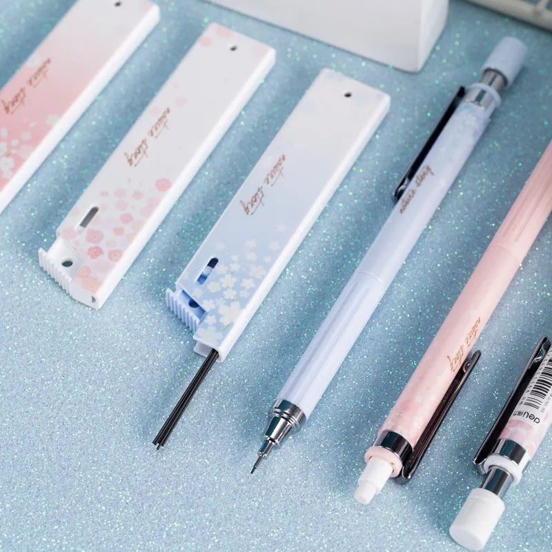 Simplified 0.5mm cartoon automatic pencil set showing three mechanical pencils and HB refill boxes