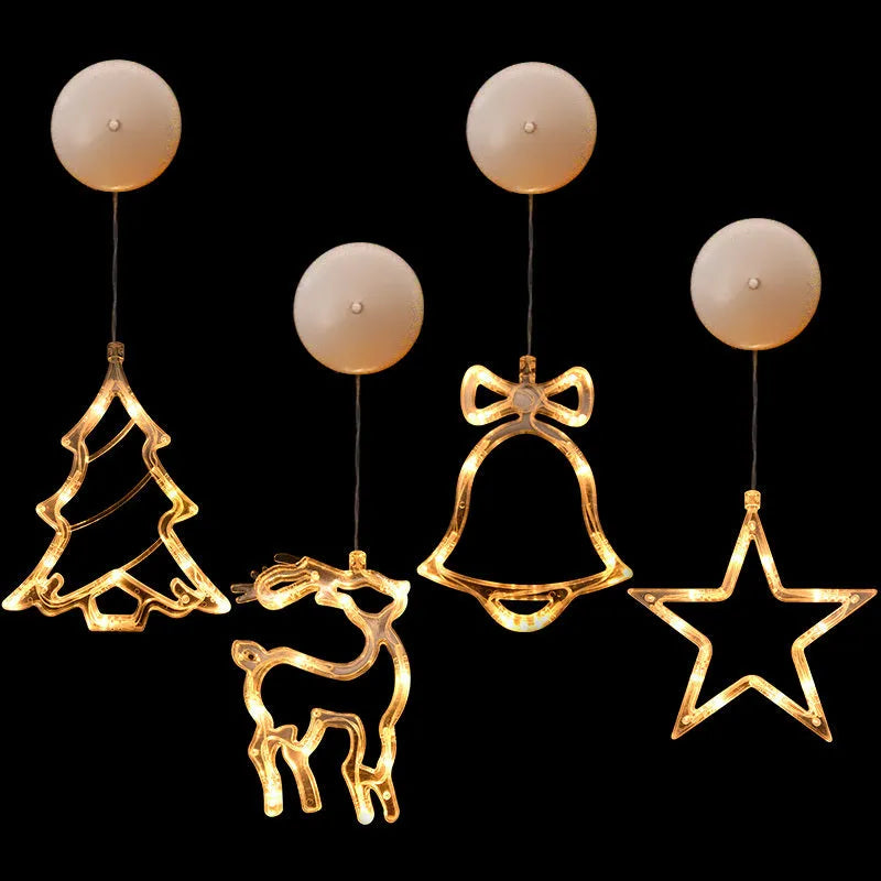 Battery-powered Christmas LED light set with Santa Claus, elk, and snowman designs stuck to a window with suction cups.