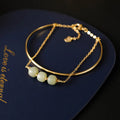 Hetian jade bracelet with gold-inlay treatment in single, double, or three-bead versions for women