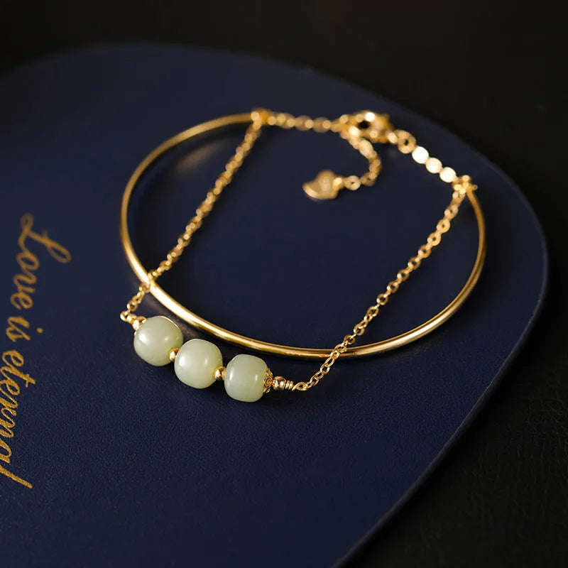 Hetian jade bracelet with gold-inlay treatment in single, double, or three-bead versions for women