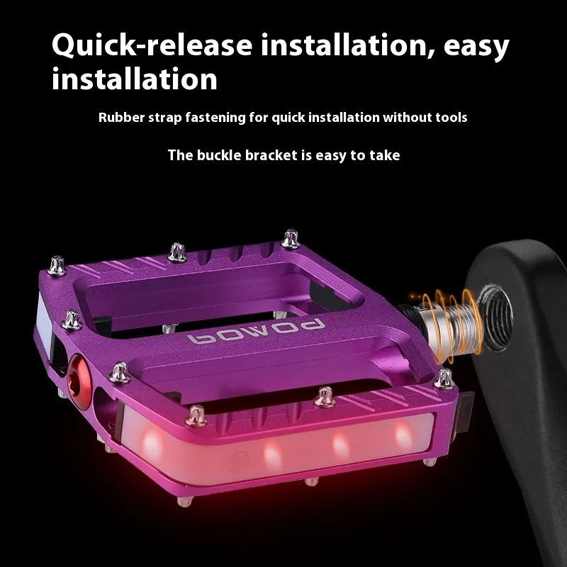 Pair of aluminium alloy bicycle pedals with integrated LED lights in multiple colour options