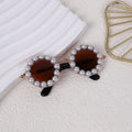 Pearl-rimmed round sunglasses for cats and dogs in black, blue, coffee, orange, and purple.