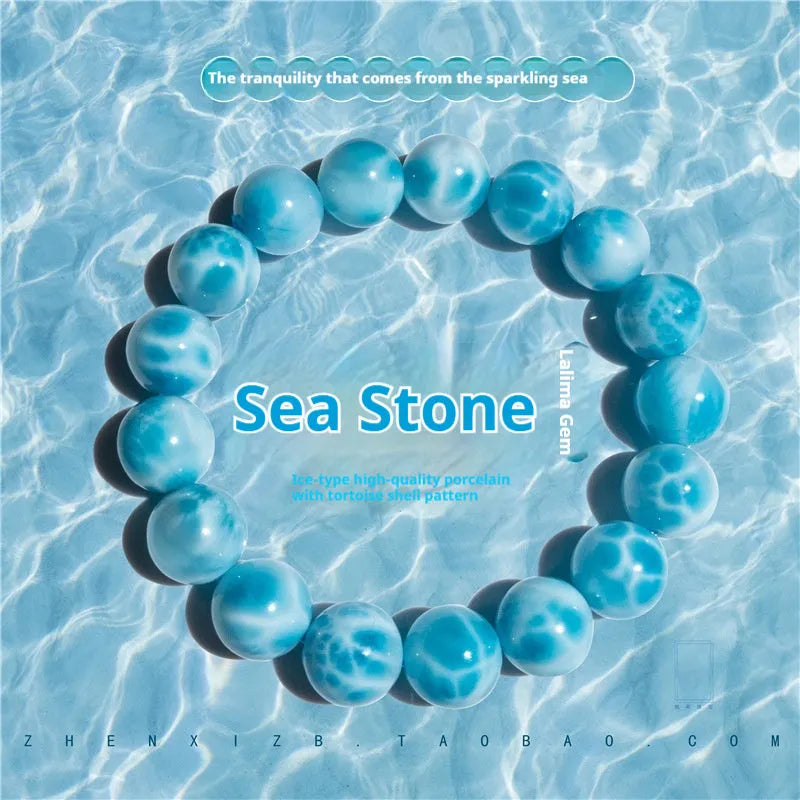 Blue Bodhi bead bracelet with manual processing and pearl accents in Maillard style, showing bead sizing options