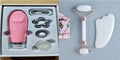 White jade facial roller with double-headed claw design and matching scraping board for manual massage