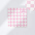 Manual ledger notebook with 100 sheets showing 12 different cover designs including checkerboard and fruit patterns
