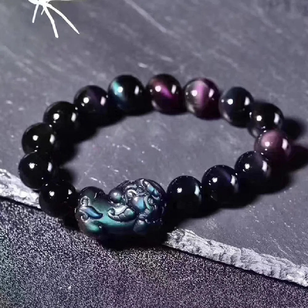 Natural ice colour eye obsidian crystal bracelet with measured beads on wrist