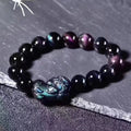 Natural ice colour eye obsidian crystal bracelet with measured beads on wrist