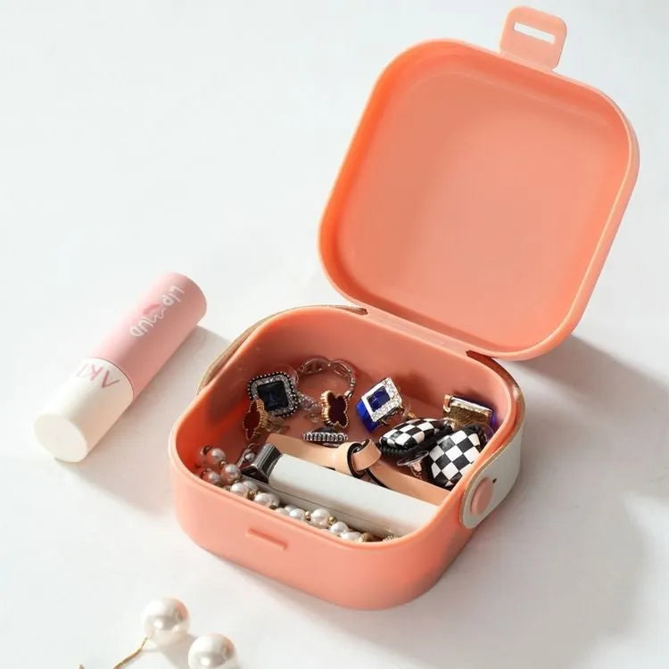 Multifunctional portable storage box in polypropylene for organising data cables and Bluetooth headsets