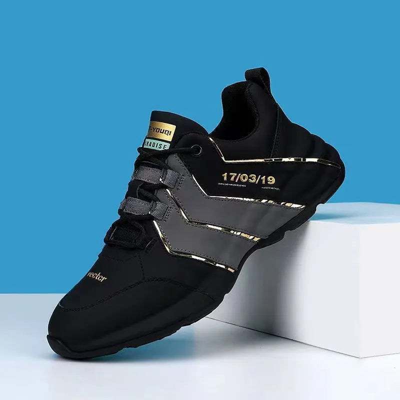 Casual low-top sneakers with round toe, front lace-up, and thick injection-moulded soles in black and grey colour option