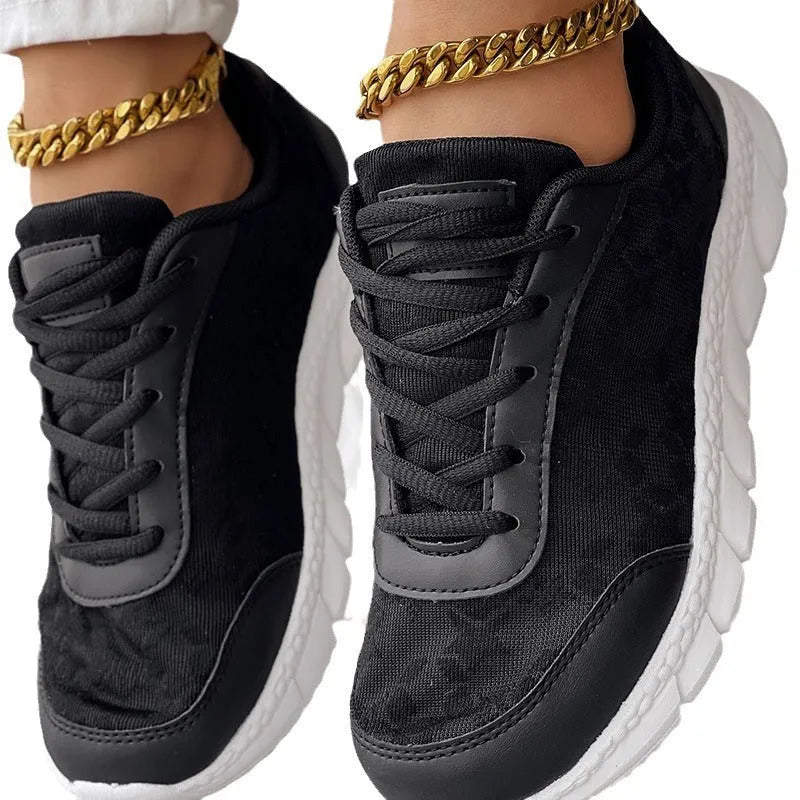 Women's canvas sports shoes with breathable upper, flat heel, and soft bottom in black, blue, pink, or white