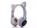 Cartoon head-mounted cat ears wireless Bluetooth headset in pink, light blue, purple, skin tone, or green with 10-metre range