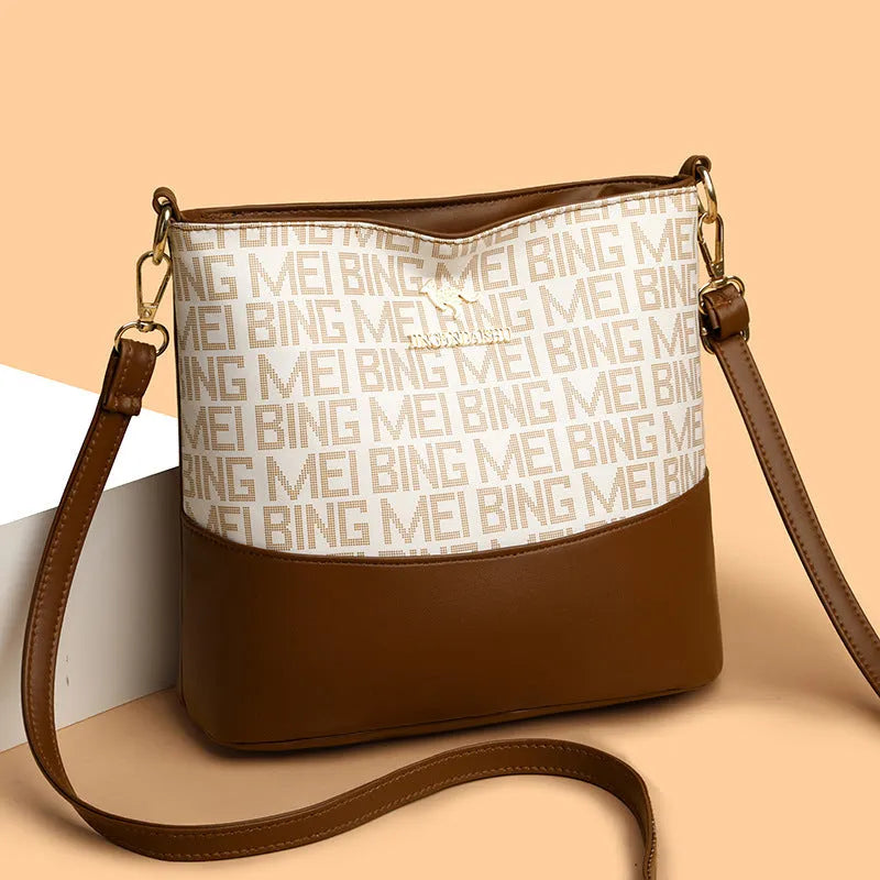 Brown retro style soft leather messenger bag with multiple compartments and sewing thread detailing