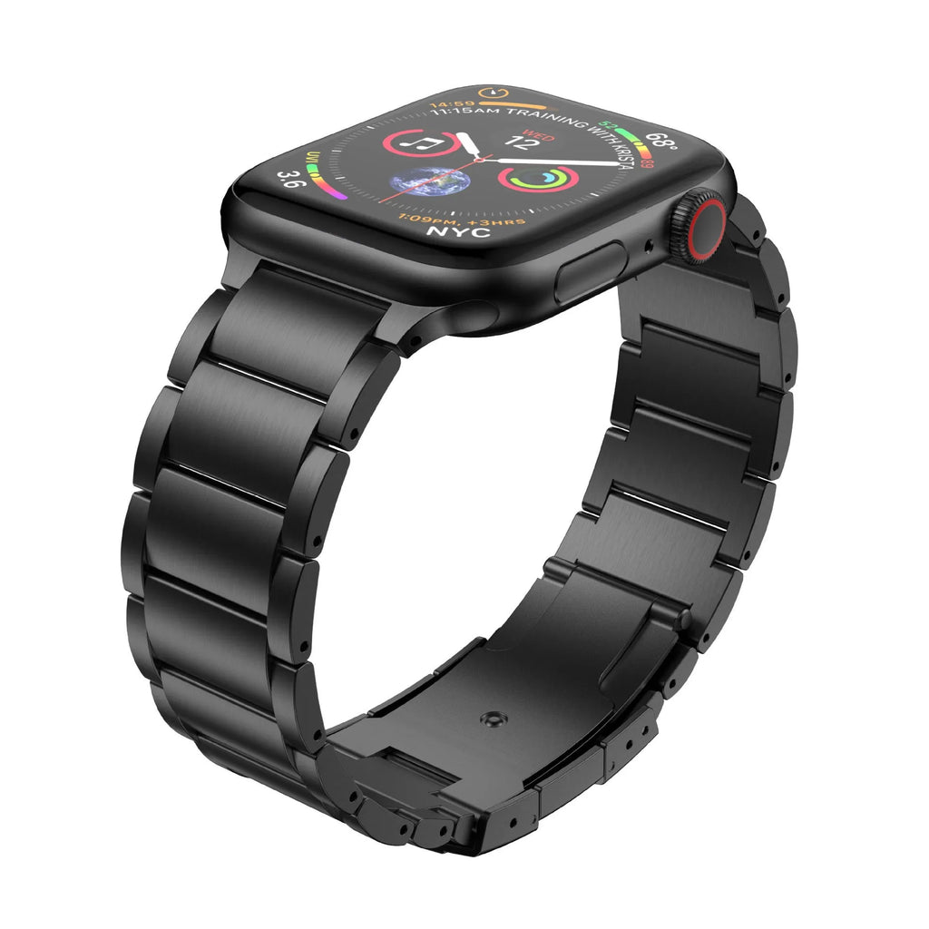 Black titanium alloy Apple Watch replacement strap with folding buckle on a wrist