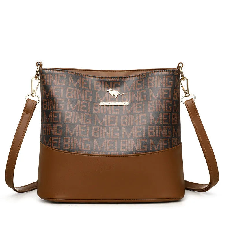 Brown retro style soft leather messenger bag with multiple compartments and sewing thread detailing