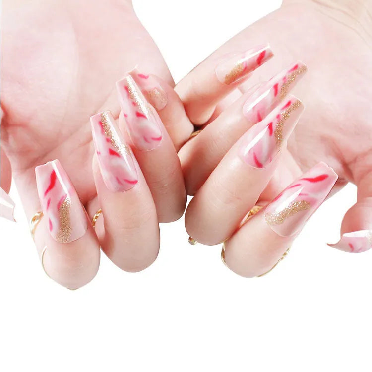 One Second Wearable Manicure press on nails showing rose, tulip, leopard and XINGX designs in blush colours