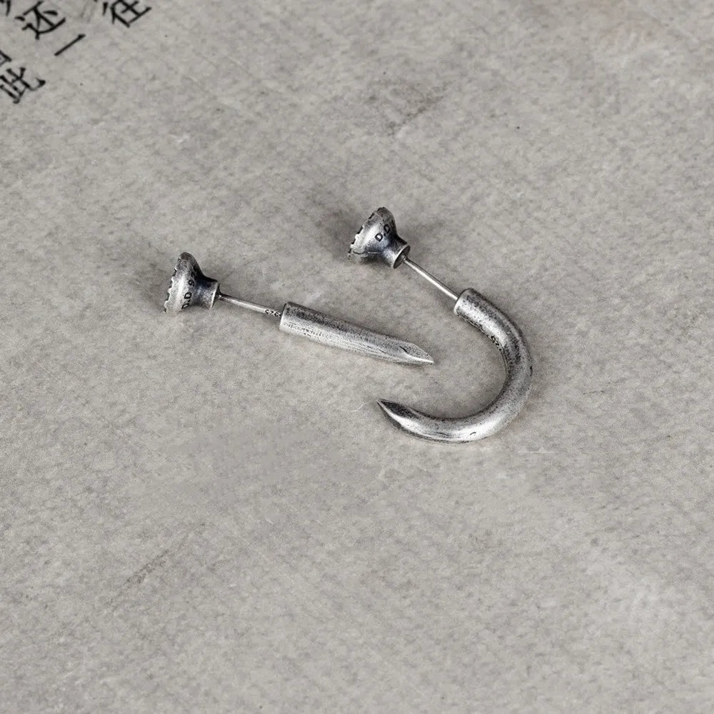 S925 sterling silver nail earrings with ear hook, showing straight and curved nail designs in punk style