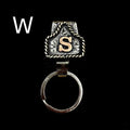 Handmade cow tag metal keychain in assorted colours, measuring 5.5cm by 3.5cm with a belt loop for keys