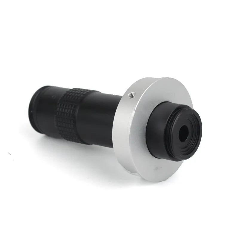 Black metal industrial camera monocular lens for 130x magnification with 60-300mm working distance.