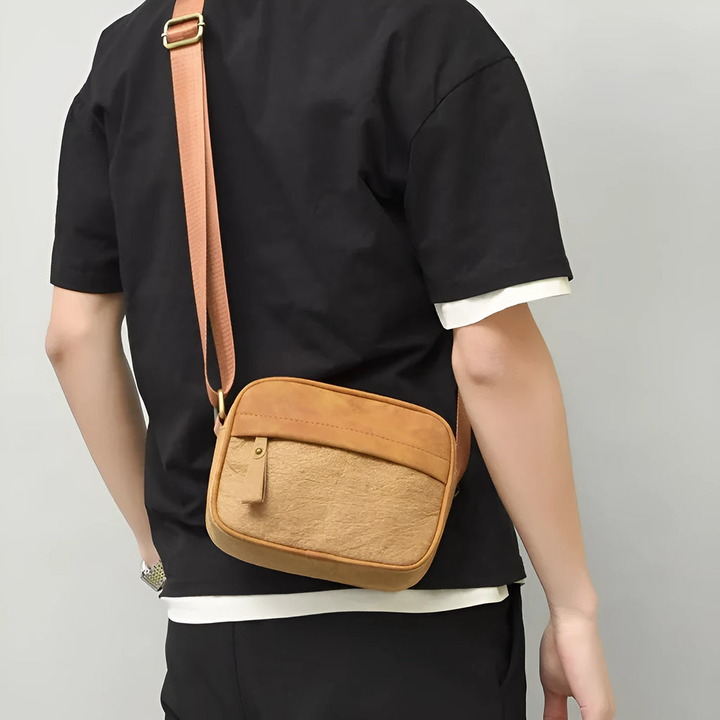 Men's paper crossbody bag in retro style available in black, brown, and silver colours