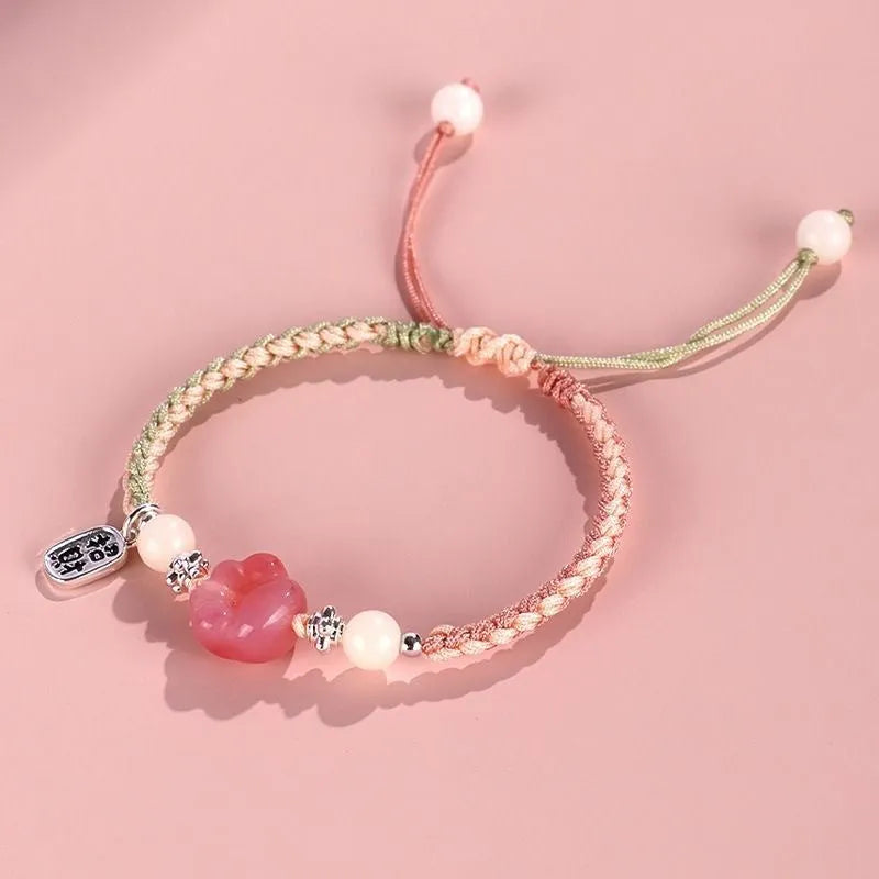 Red cat's paw couple bracelet with woven glass beads in handcrafted pastoral design
