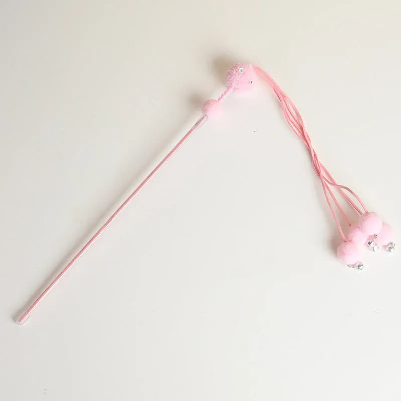 Blue funny cat stick toy with colourful fabric tassels on a plastic wand for interactive play with cats.