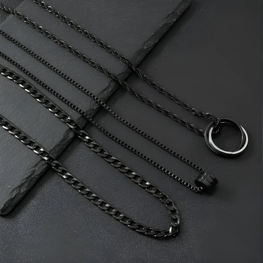 Black three-piece stainless steel men's necklace set with titanium steel cylindrical ring pendant