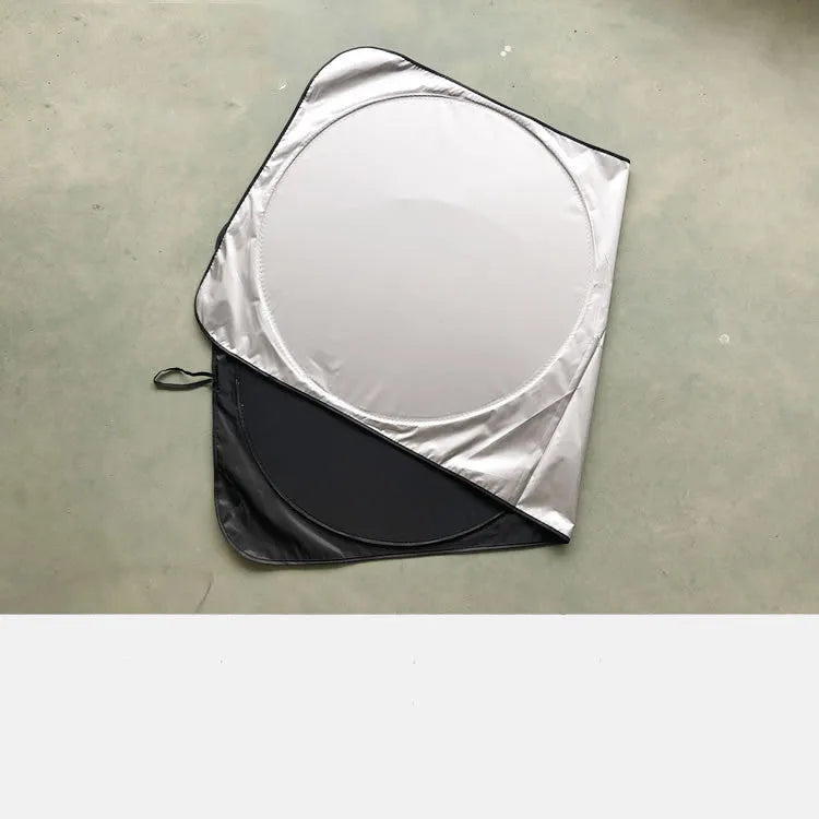 Silver reflective car sunshade measuring 190cm by 90cm folded in its cloth storage bag