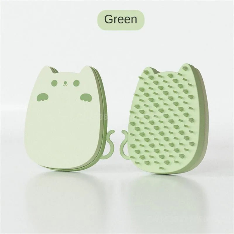 Brown silicone pet comb with dual-texture teeth for grooming cats and dogs.