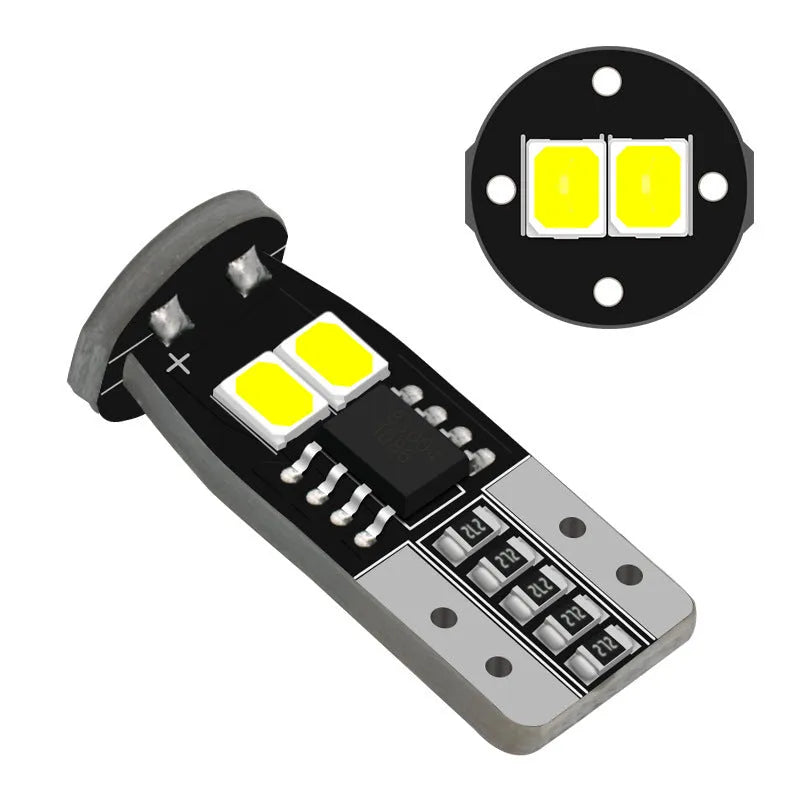 Small white 12V car interior lamp for licence plate reading light.