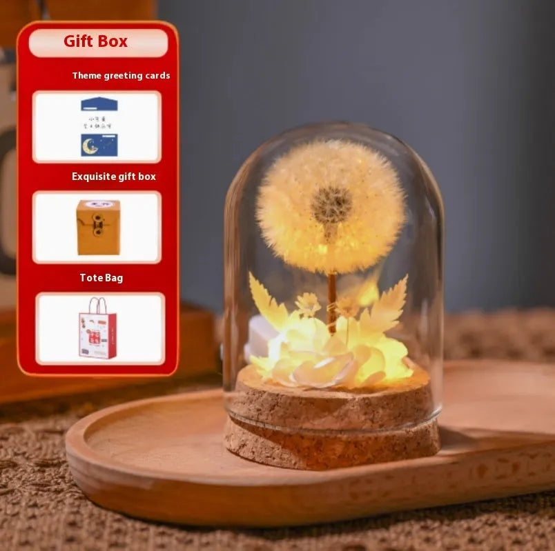 Glass dandelion night light ornament with gradient colour finish on wooden table