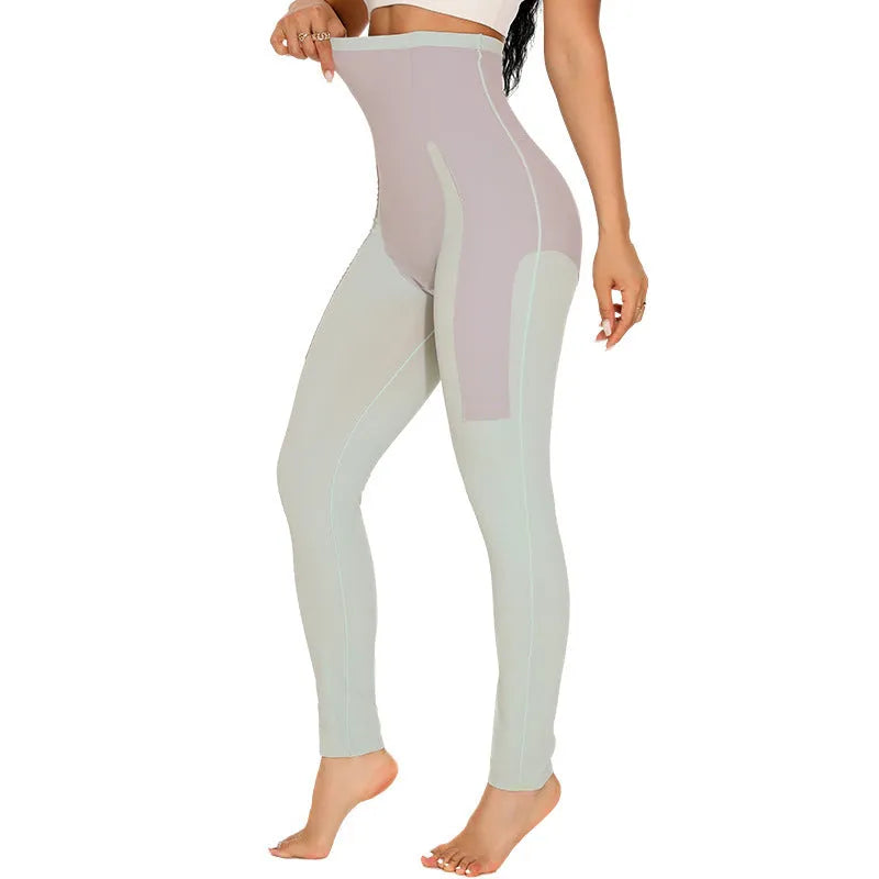 Women's black belly contracting yoga trousers with seamless design on a mannequin