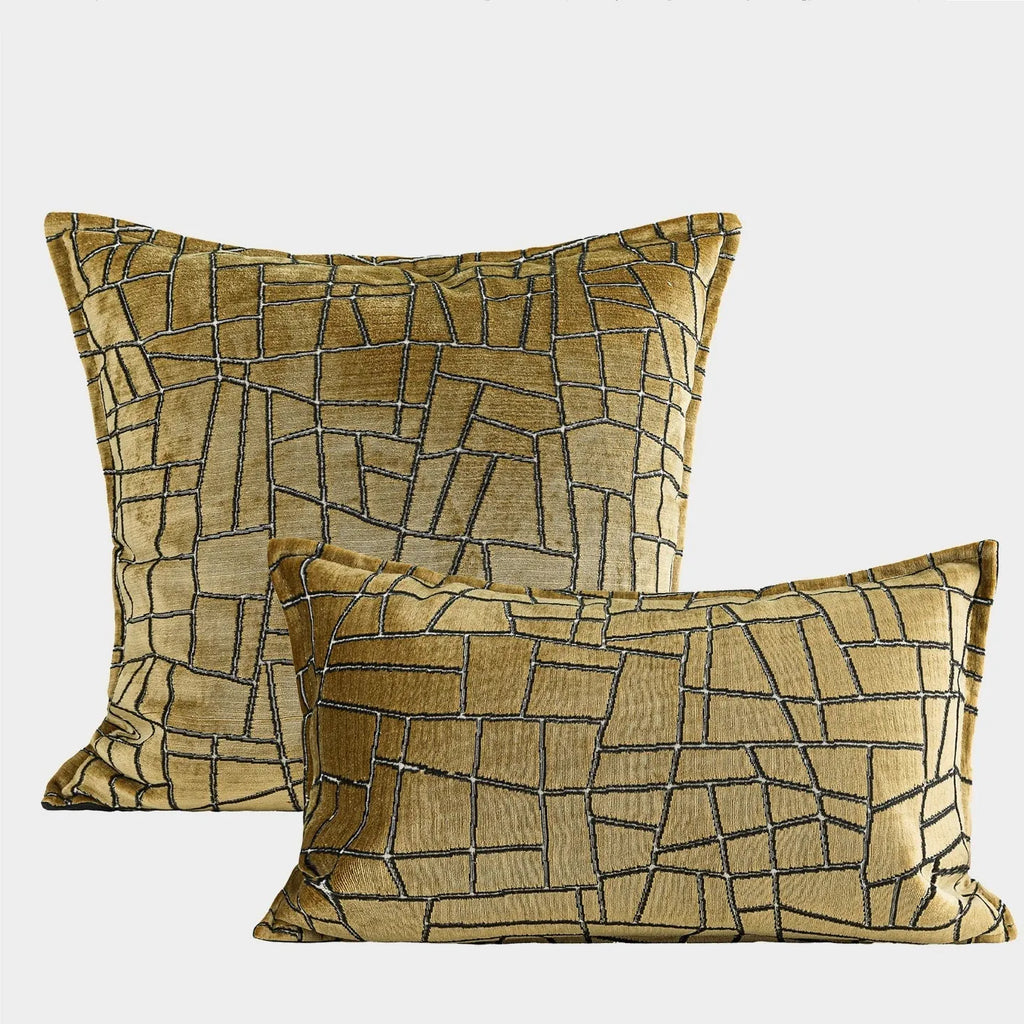 Tuhao gold geometric abstract pillow in 50x50cm size with feather velvet texture on a sofa