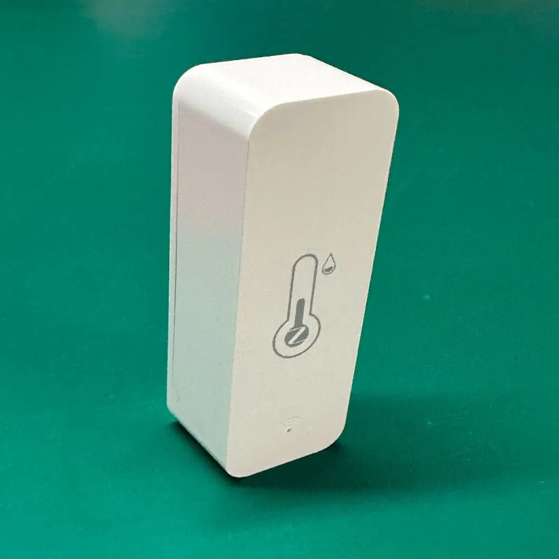 White rectangular WiFi Zigbee temperature humidity sensor measuring 72mm by 25mm by 20mm
