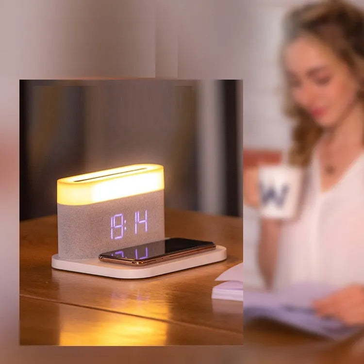 White wireless charging table lamp with digital clock display and bedside lighting functions