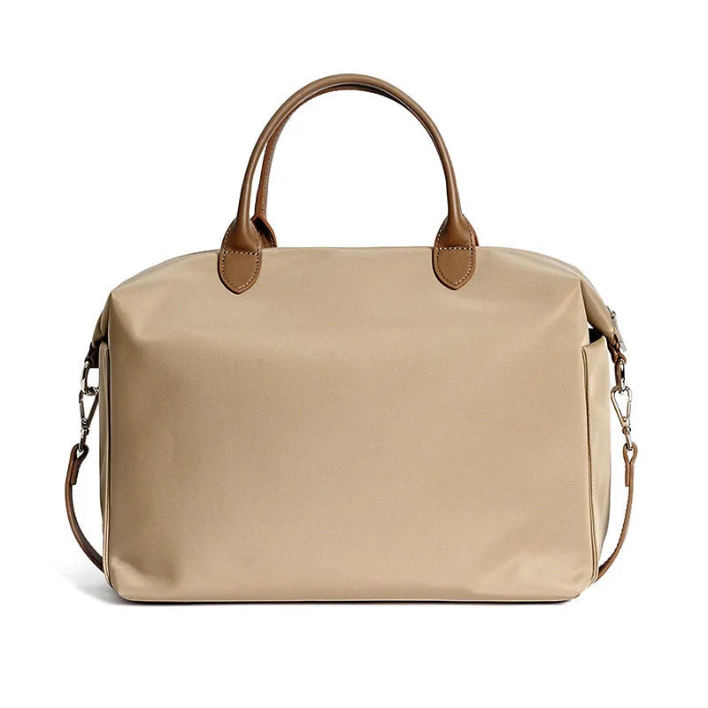 Nylon waterproof shoulder bag with leather handles in black or light khaki colour