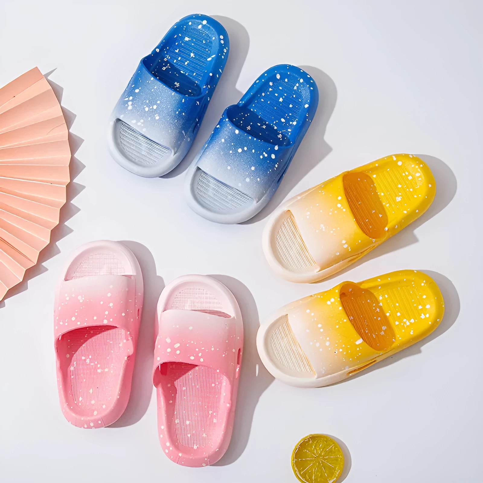 Gradient blue PVC children's summer slippers sandals on a white background.